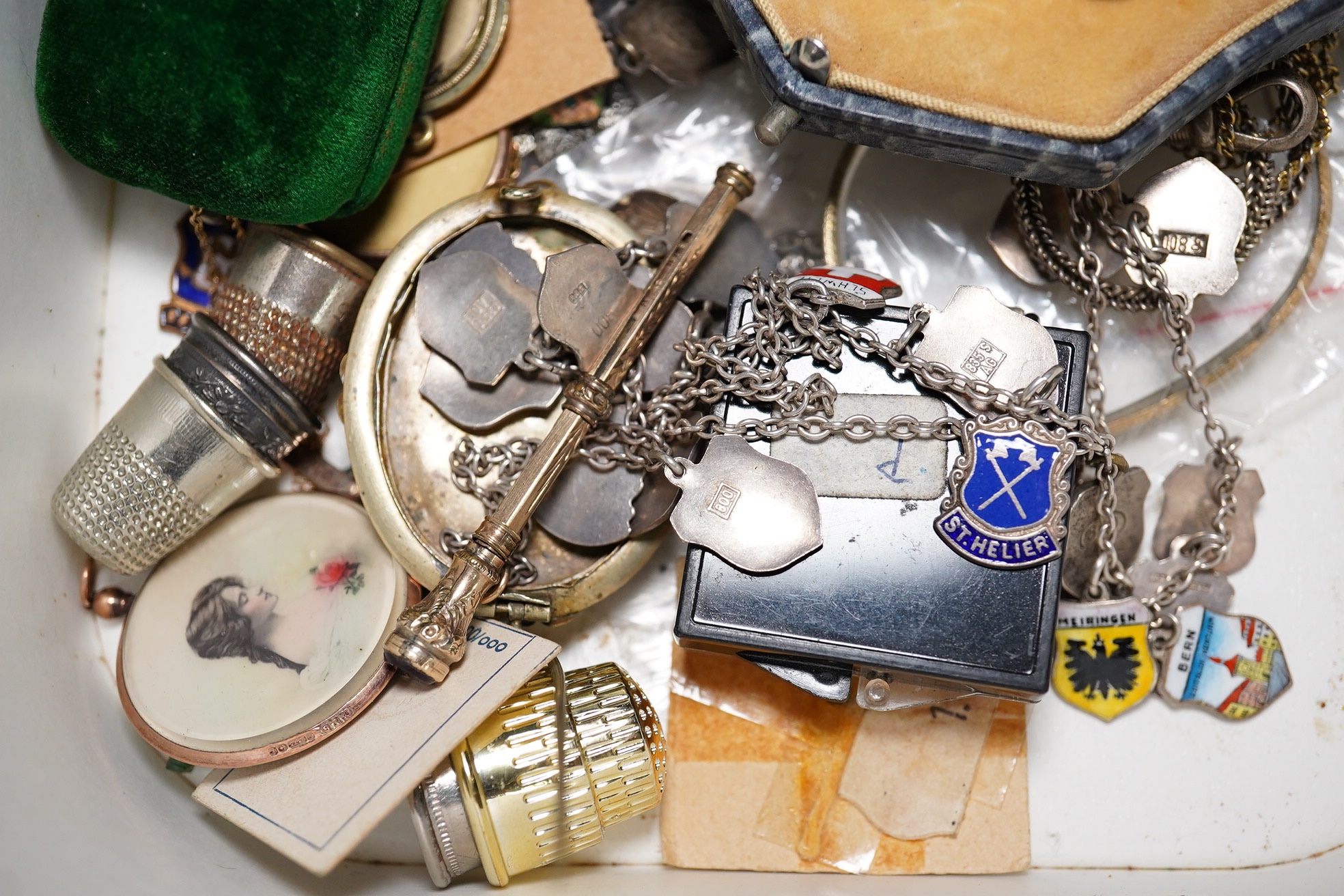 A quantity of assorted jewellery including costume, 9ct and diamond set stick pin, enamelled charms part sterling and enamel set etc. Condition - poor to fair